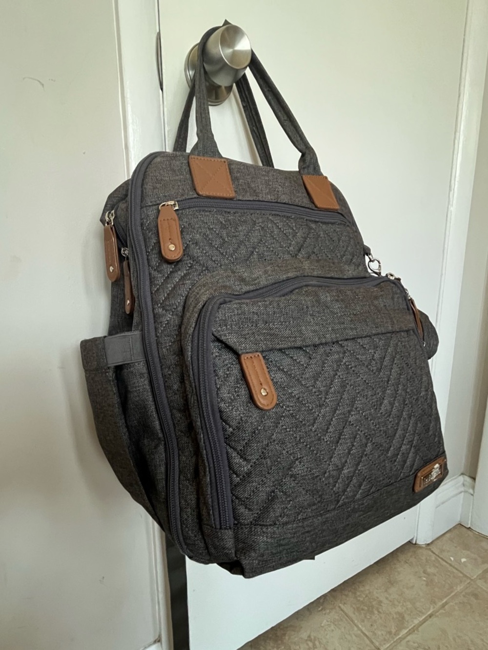 Grey Diaper Bag Backpack with a changing pad insert